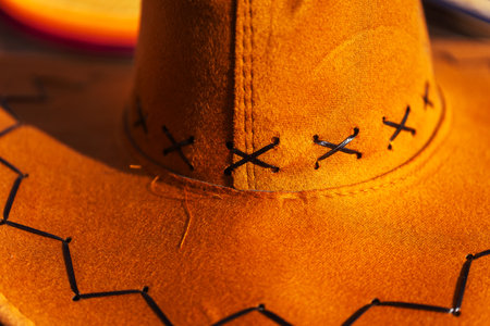 Closeup of a cowboy hat with black stitching detailの写真素材