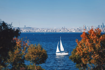 a white yacht in the Bosphorus Strait. Istanbul Marmara Sea Tour by luxury boatの写真素材