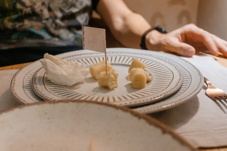 plates on the table of a cafe. food-stained white platesの写真素材