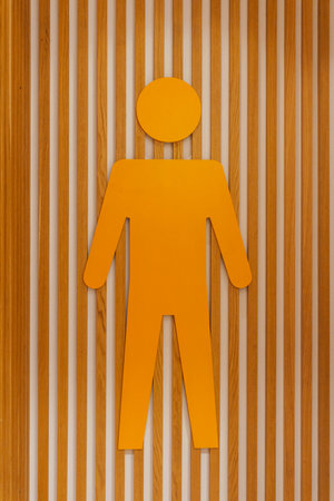 silhouette of a man on a wooden background. cardboard man on the wallの写真素材