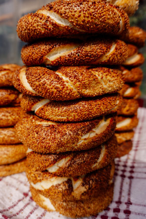 Turkish simits for sale on the street. Hot sesame buns on a store shelf