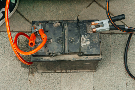 the battery is connected by wires. shorting the battery for repair workの写真素材