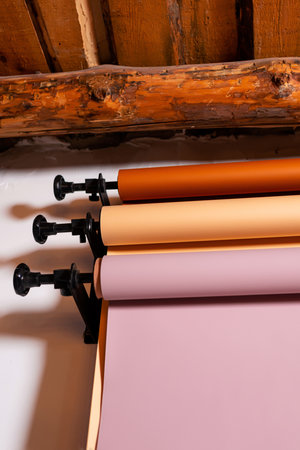 mounts for colored paper backgrounds for photo studio. holders for roll paper backgrounds