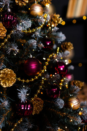 Plastic toys on a green tree. Decoration in a photo studio
