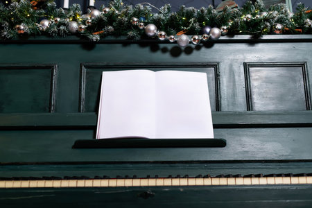 green piano blue wall decorated with christmas tree decor. classic christmas photo zone with pianoの写真素材