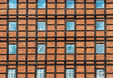 Prussian wall texture. Wooden beams and bricks with windows in foil.の写真素材