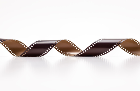 35mm photo film rolls. Isolated on white background.の写真素材