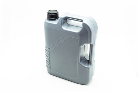 Gray, plastic motor oil container with a capacity of five liters. Isolated on a white backgroundの写真素材