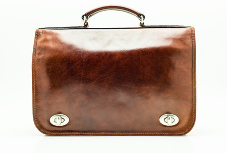 Elegant brown leather briefcase. Isolated on a white backgroundの写真素材