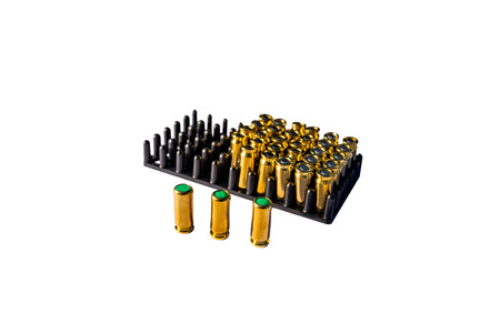 A lot of blind cartridges for guns in the package with 8mm caliber, isolated on a white background.