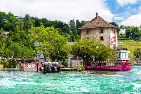 Neuhausen am Rheinfall, Switzerland - 23 July 2019. Waterfall on the river Rhine in Neuhausen am...