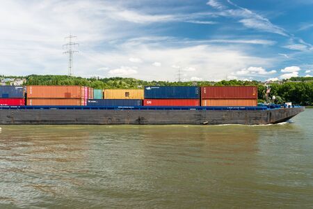 Koblenz, Germany - 1 June 2019. Two connected windmills on the Rhine River in western Germany in Koblenz.のeditorial素材