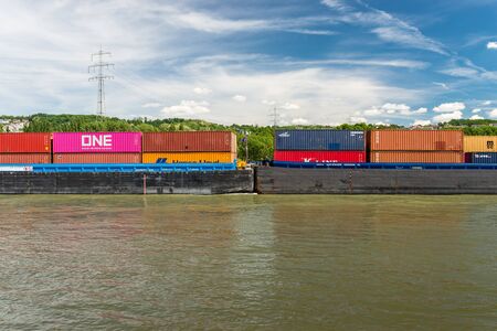 Koblenz, Germany - 1 June 2019. Two connected windmills on the Rhine River in western Germany in Koblenz.のeditorial素材
