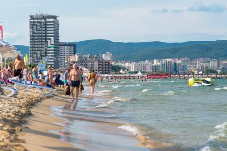 Sunny Beach, Bulgaria July 15, 2019. Crowd of tourists on the Black Sea beach, in Sunny Beach, Bulgaria, on a beautiful hot summer day.のeditorial素材