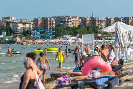 Sunny Beach, Bulgaria July 15, 2019. Crowd of tourists on the Black Sea beach, in Sunny Beach, Bulgaria, on a beautiful hot summer day.のeditorial素材