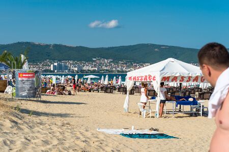 Sunny Beach, Bulgaria July 15, 2019. Crowd of tourists on the Black Sea beach, in Sunny Beach, Bulgaria, on a beautiful hot summer day.のeditorial素材