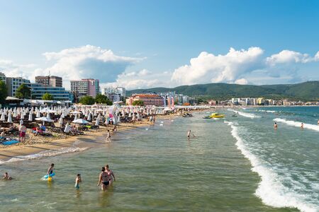 Sunny Beach, Bulgaria July 15, 2019. Crowd of tourists on the Black Sea beach, in Sunny Beach, Bulgaria, on a beautiful hot summer day.のeditorial素材