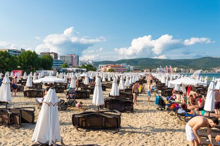 Sunny Beach, Bulgaria July 15, 2019. Crowd of tourists on the Black Sea beach, in Sunny Beach, Bulgaria, on a beautiful hot summer day.のeditorial素材
