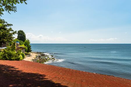 Restaurant in Nessebar on the coast of the beautiful Black Sea in Bulgaria, visible sea line and...