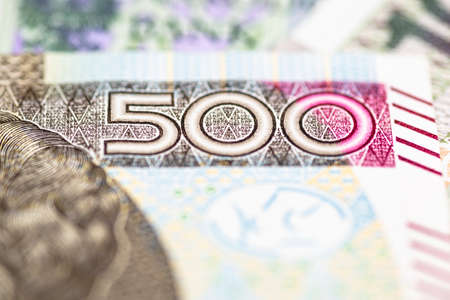 Macro photo of the front side of a rare Polish PLN 500 banknote, close-up on the inscriptions.の写真素材