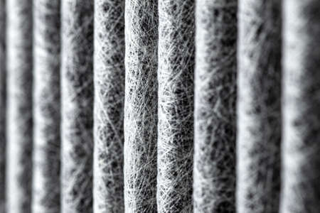 A macro shot of the surface rectangular, carbon cabin filter. Can be used as background, visible...