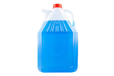 Winter blue windshield washer fluid in a five liter bottle, closed with a red cap, isolated on a white backgroundの写真素材