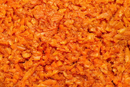 Background made from close up of a carrot salad, macro shot from the top view.の写真素材