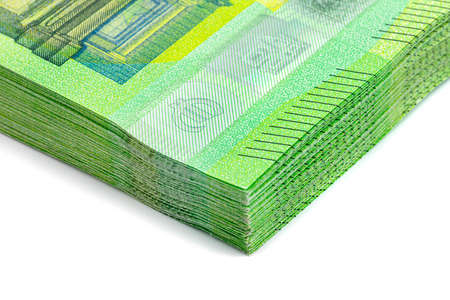 Macro shot of the European Union 100 EURO banknote, stack of banknotes lying on top of each other,...