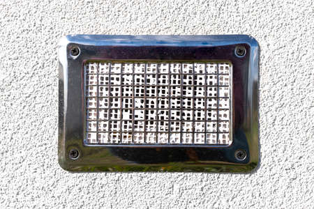Air intake from the manor to the fireplace with a closed combustion chamber, silver grille on the...