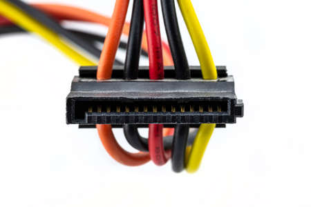 A 15 contacts serial ATA plug for powering a hard disk or CD drive coming from a computer power...