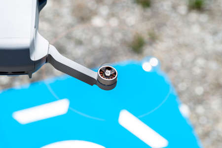 A close-up shot of the drone rotating plastic propellers with brushless motors against the backdrop...