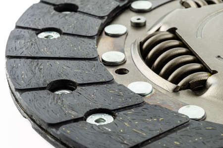 Used car clutch with damper springs and friction linings, isolated on a white background.の写真素材