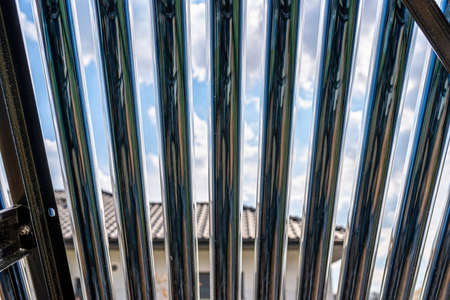 Modern pressure collector for heating domestic hot water, close-up on vacuum pipes.の写真素材