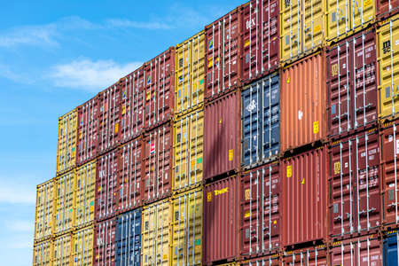 Andernach, Germany - May 15, 2022. A stack of containers standing on top of each other in the loading yard by the wharf.のeditorial素材
