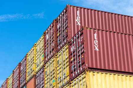 Andernach, Germany - May 15, 2022. A stack of containers standing on top of each other in the...