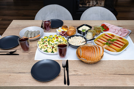 Traditional dishes from Poland for Easter breakfast, lying on the table in the dining room.