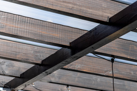 Construction of a terrace behind the house with various carpentry joints.
