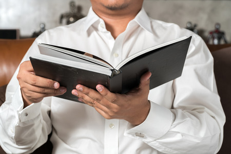 man reading a bookの写真素材