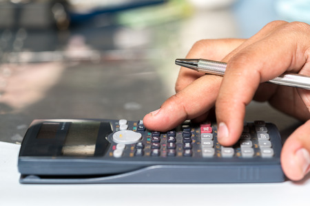 Businessmen use the calculatorの写真素材