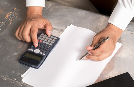 Businessmen use the calculatorの写真素材