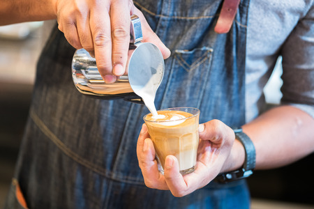 Making of cafe latte art, heart shapeの写真素材