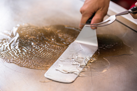 Pan with warm oil  preparation for cookingの写真素材