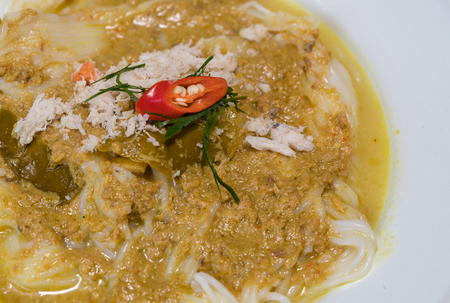 rice noodles in crab curry sauce with vegetables  , famous thai foodの写真素材