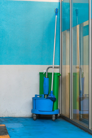 cleaning equipment with cart at the cornerの写真素材
