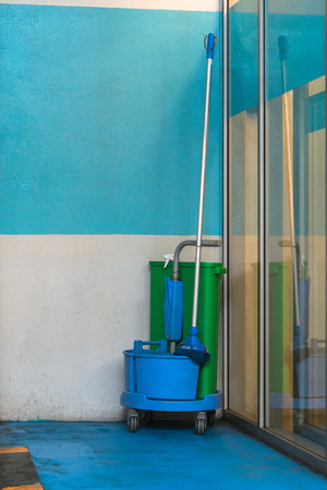 cleaning equipment with cart at the cornerの写真素材