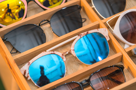 Many fashion glasses on the storeの写真素材