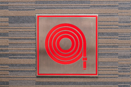 Red  fire hydrant plug signの写真素材