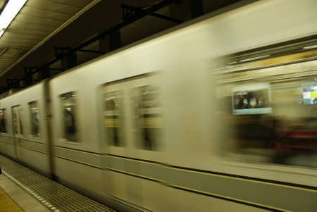 Moving under ground train in the station