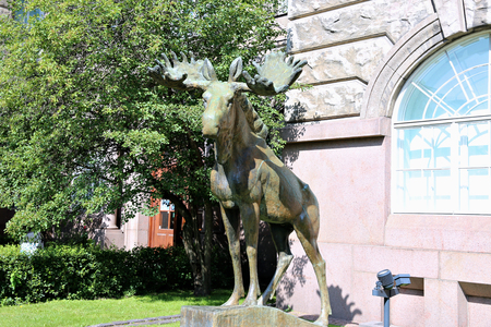 HELSINKI, FINLAND - JULY 9, 2015: Bronze sculpture of a moose in front of the Museum of Zoology in Helsinkiのeditorial素材