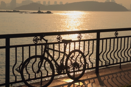 A bicycle in sunset の写真素材